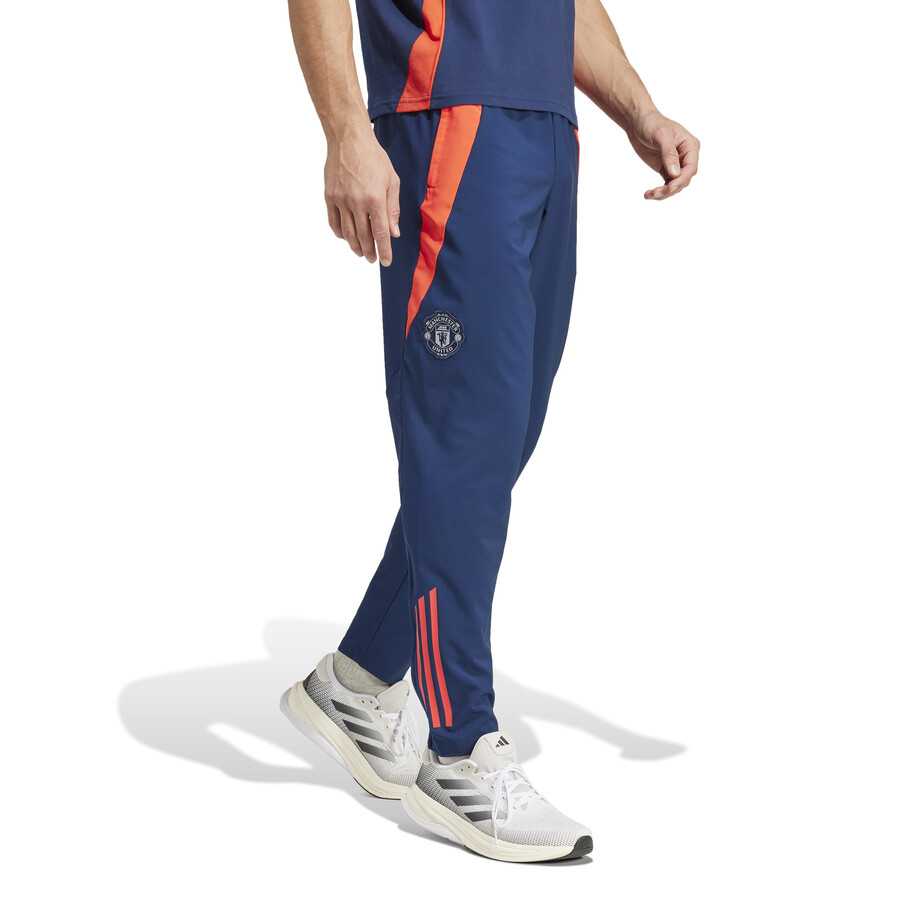 Pantalon survêtement Manchester United woven bleu orange 2024/25