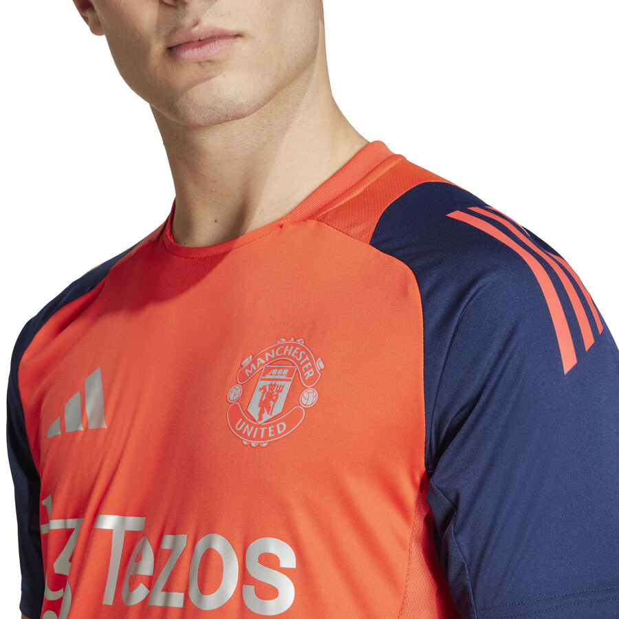 Maillot entraînement Manchester United orange bleu 2024/25