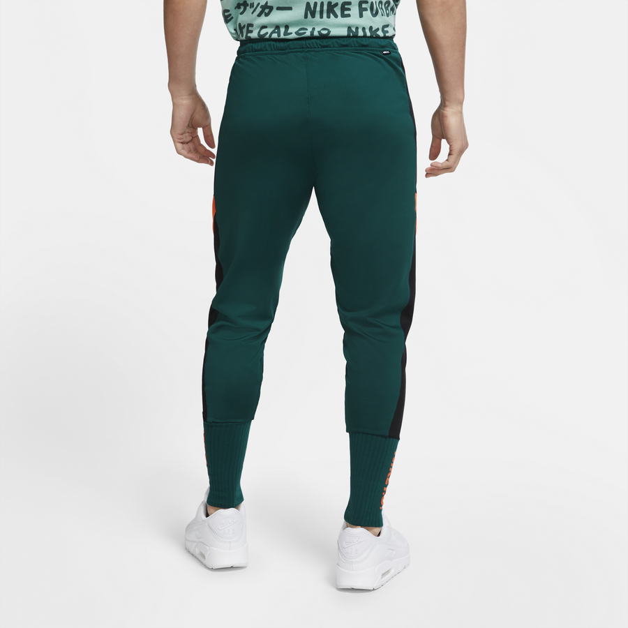 Pantalon survêtement Nike vert orange